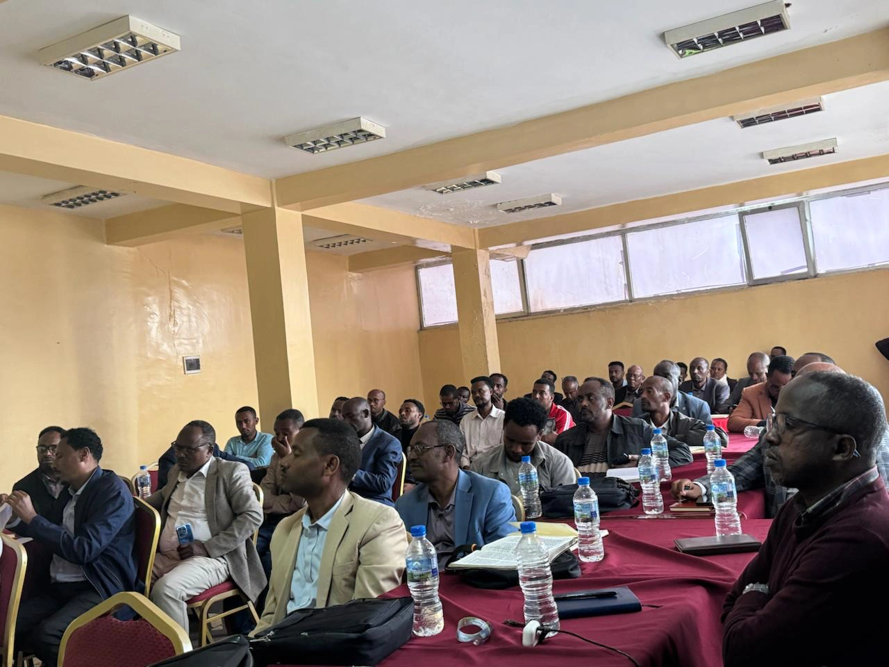 Participants seated at a REACH Ethiopia training